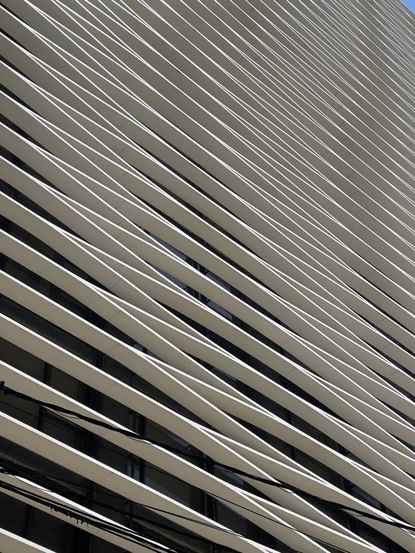 Rows of angled white fins across the face of a building in Beirut
