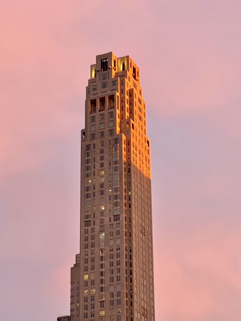 Terracotta tower glowing at sunset